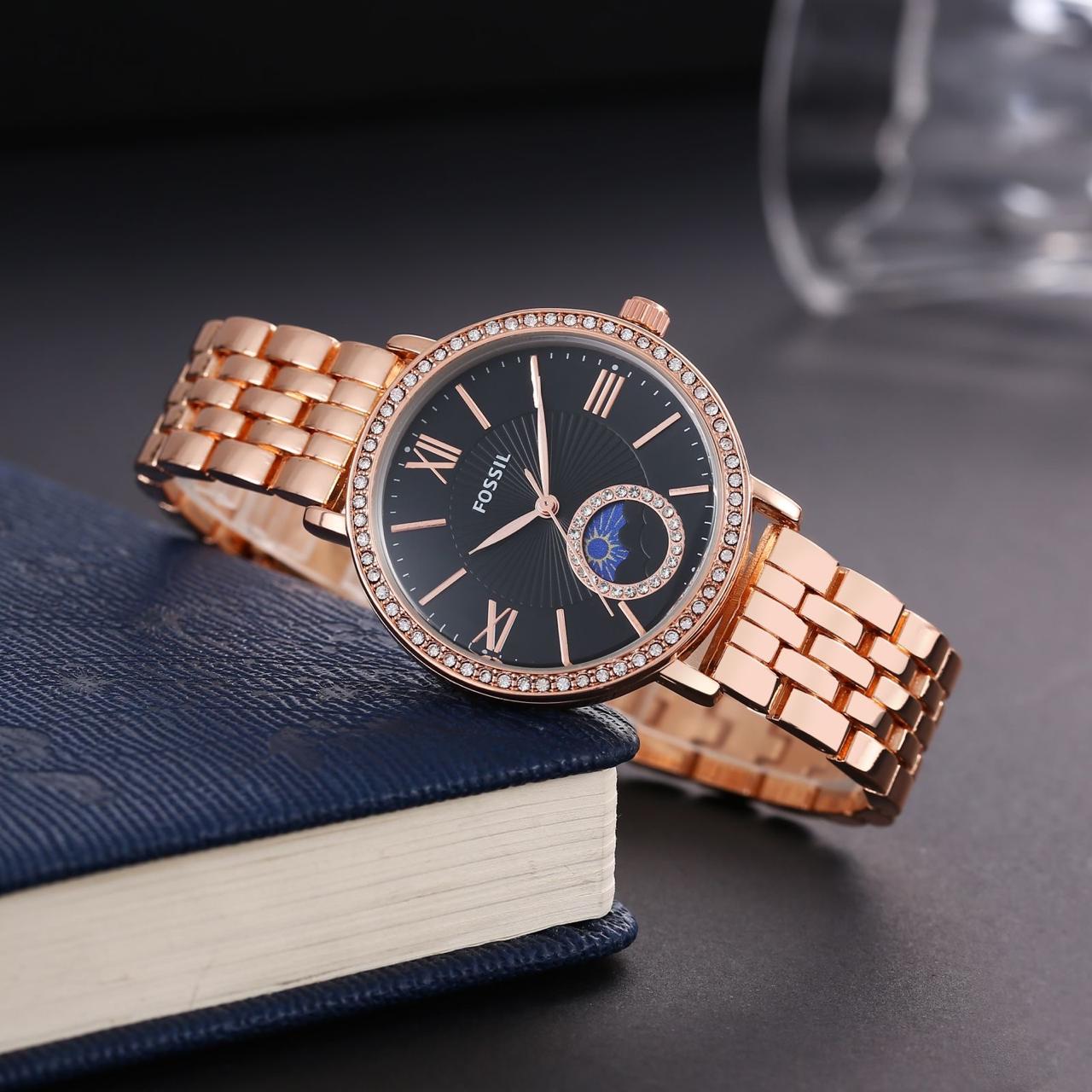 Fossil ladies watch sun and moon working