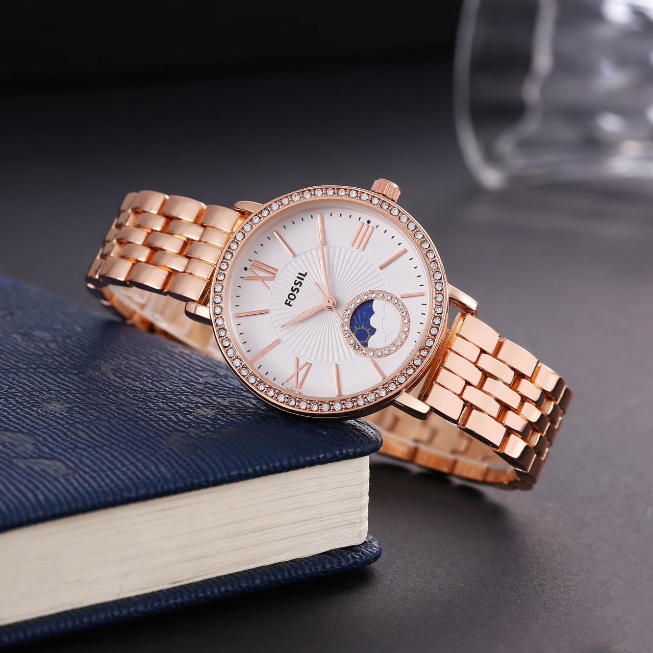 Fossil ladies watch sun and moon working