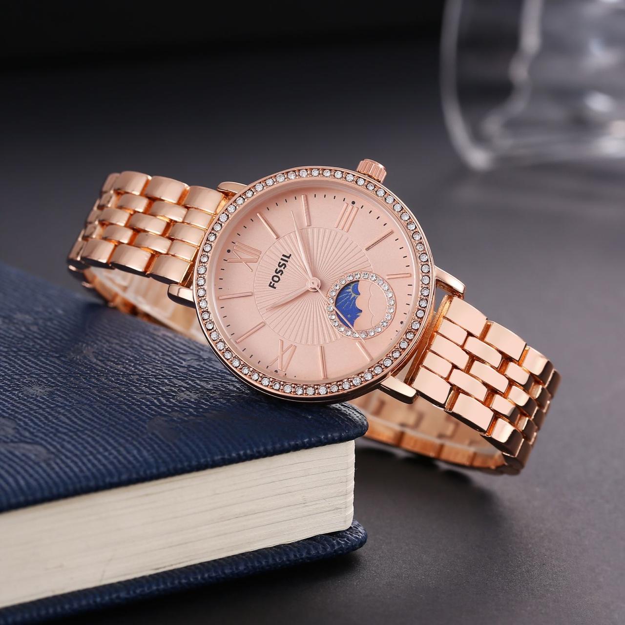 Fossil ladies watch sun and moon working