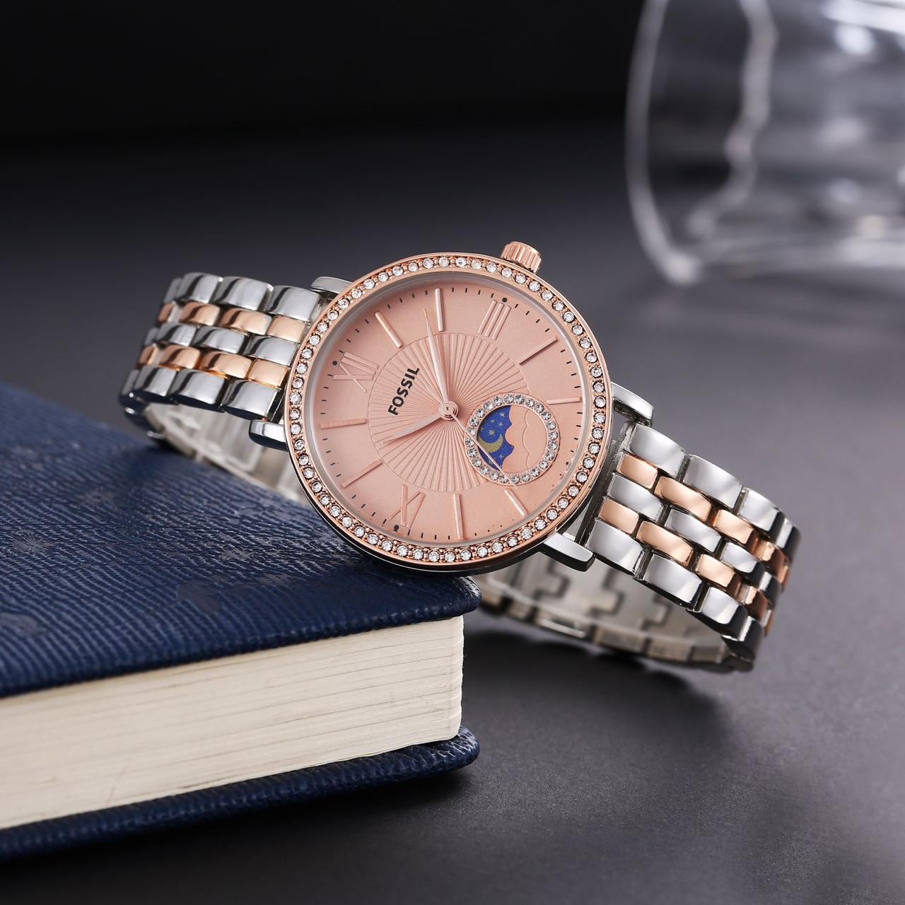 Fossil ladies watch sun and moon working
