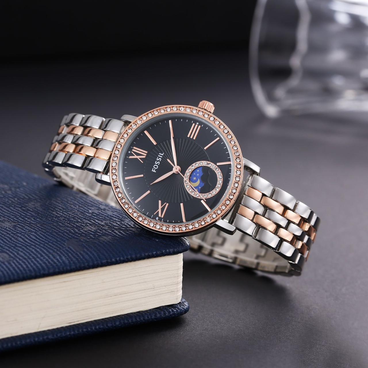 Fossil ladies watch sun and moon working